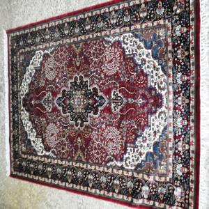 HAND KNOTTED SILK CARPETS STOCK