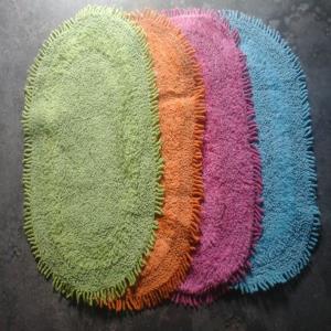 Oval Fringed bathmats Stock