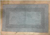 Reversible bath rug